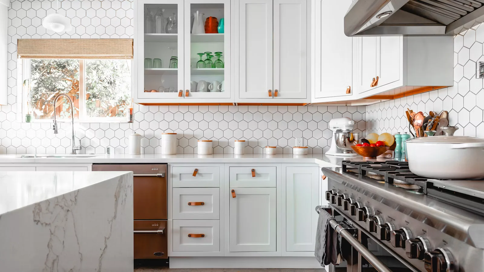 Kitchen with a wood island and pendant lights