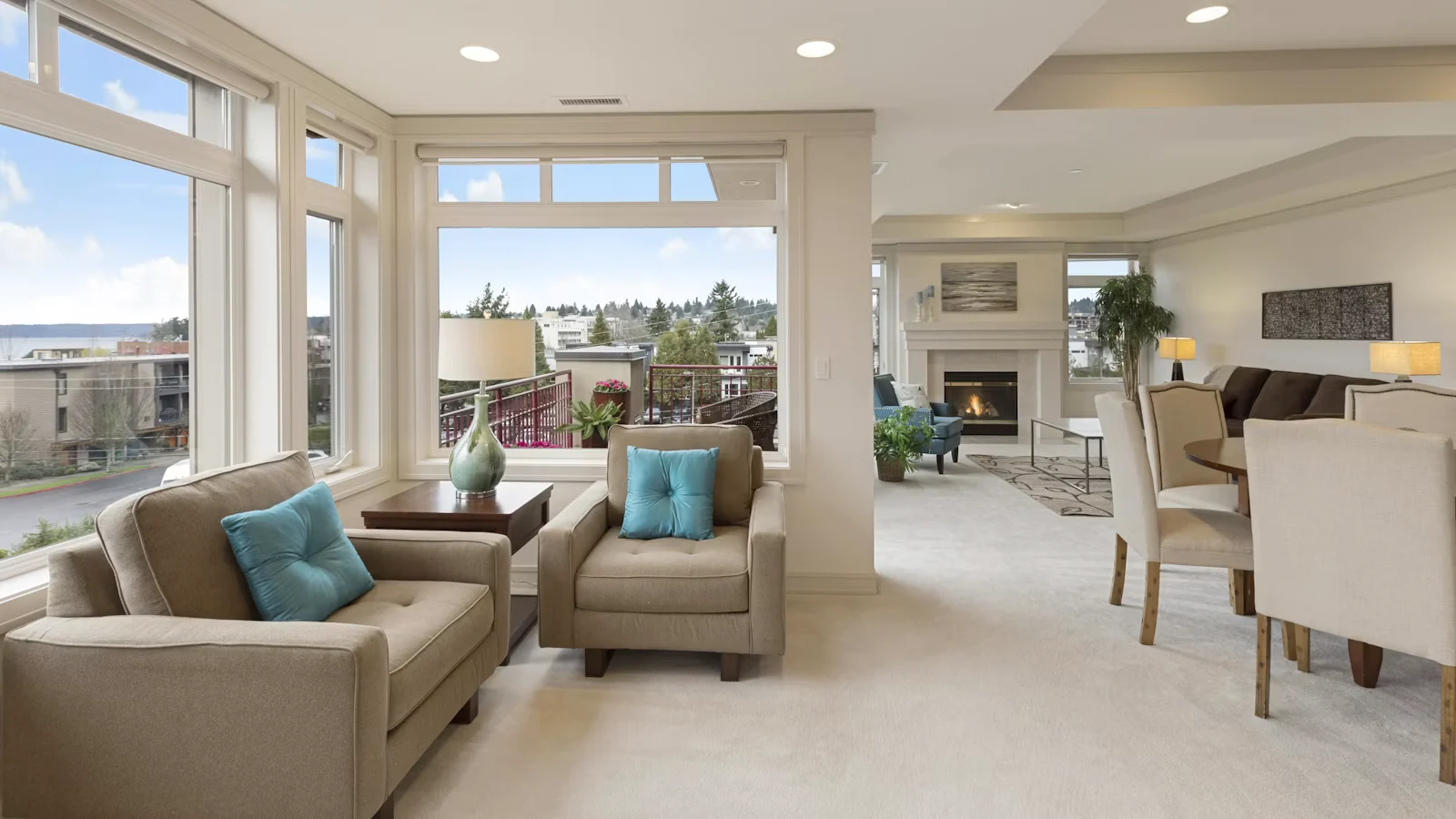 Furnished living room with a cream sofa and wood floors